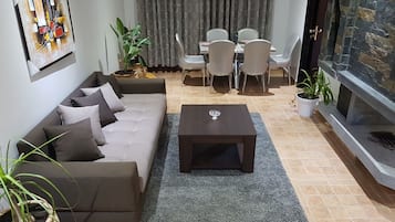 Family Chalet, 3 Bedrooms | Living room | Flat-screen TV, fireplace