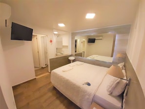Quarto casal superior | Cofres nos quartos, Wi-Fi de cortesia, roupa de cama