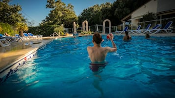 Seasonal outdoor pool, pool loungers