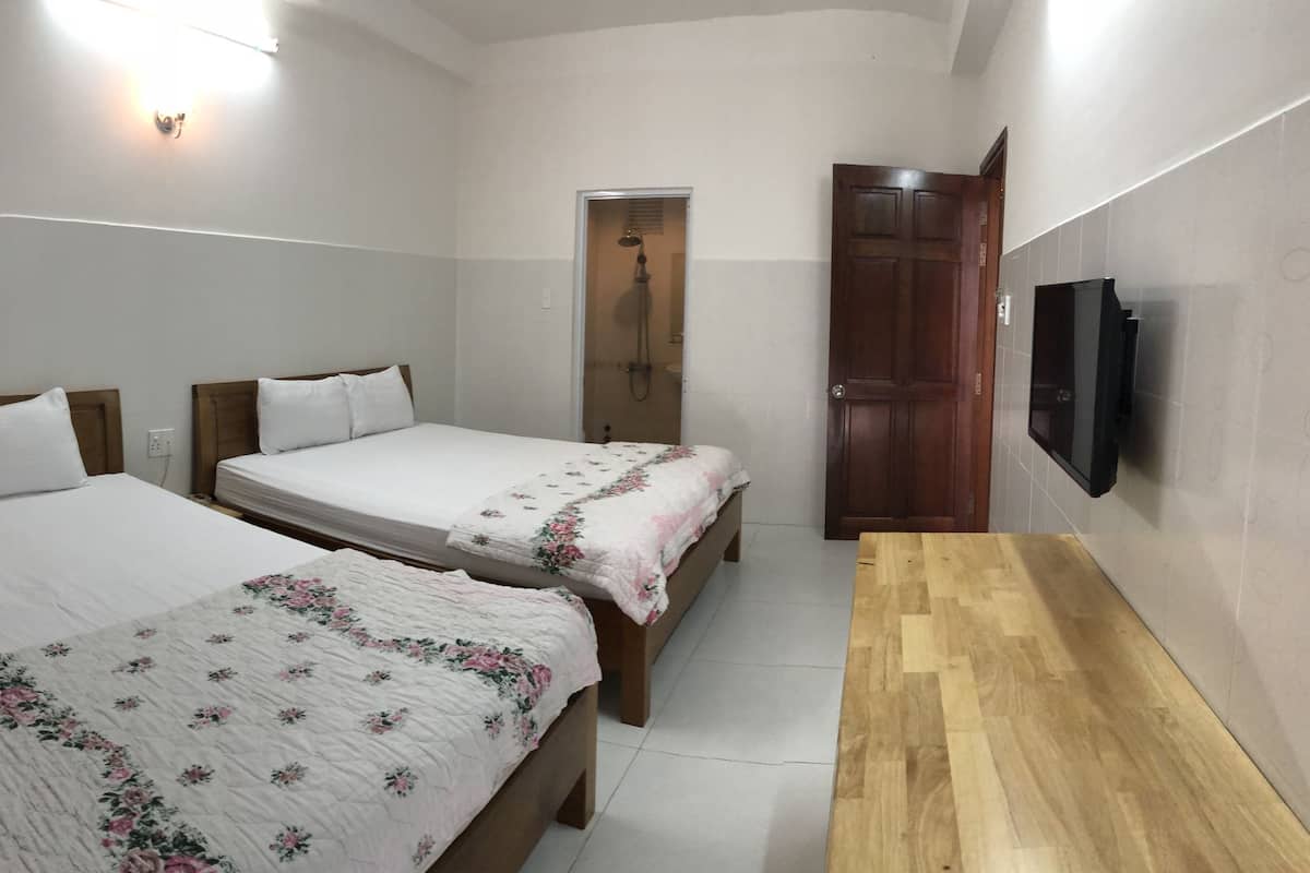 Habitación familiar | Escritorio, wifi gratis y ropa de cama