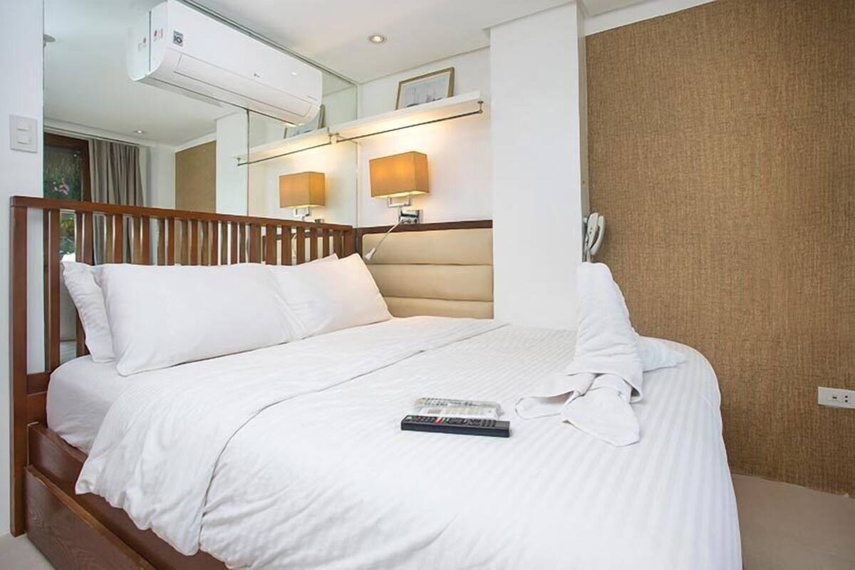 Kamar Deluks, pemandangan pantai (Ground Floor) | Seprai katun Mesir, seprai premium, minibar, dan brankas