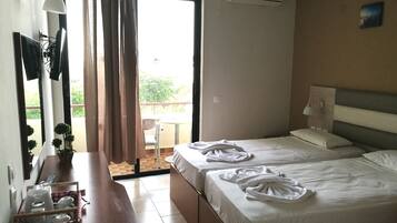 Basic Double or Twin Room | Iron/ironing board, free cribs/infant beds, WiFi, bed sheets