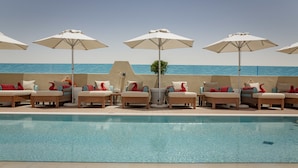 Outdoor pool, open 6:30 AM to 10 PM, pool umbrellas - Roda Links Al Nasr (Dubai)
