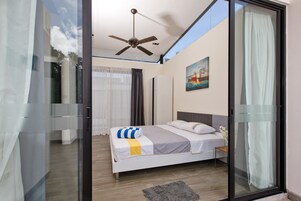 3-Bedroom House with Garden View | 1 bedroom, in-room safe, blackout drapes, iron/ironing board