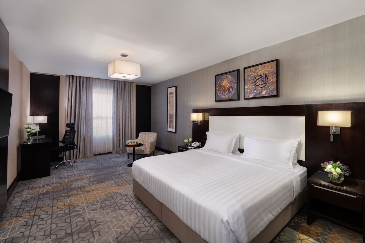 Deluxe kamer, 2 eenpersoonsbedden | 1 slaapkamer, een minibar, een kluis op de kamer, een bureau