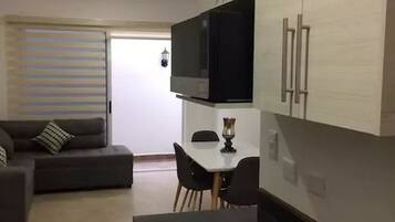 Family Townhome, 2 Bedrooms | Private kitchen | Full-sized fridge, microwave