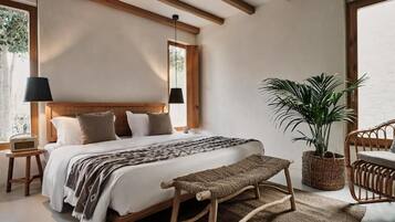 Suite, Terrasse, Gartenblick | Hochwertige Bettwaren, Minibar, Zimmersafe, individuell dekoriert