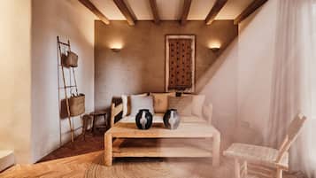Suite, Patio, Garden View | Living area | TV
