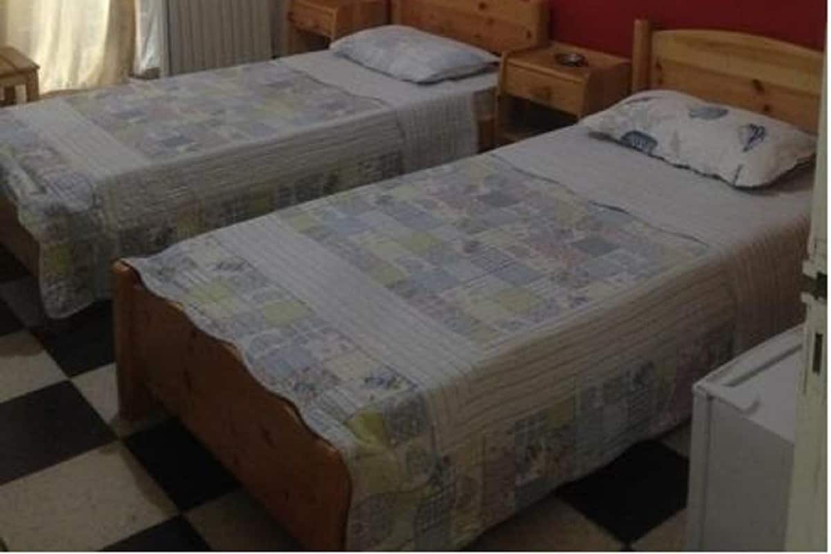 Chambre avec lits jumeaux | Minibar, rideaux occultants, Wi-Fi gratuit, draps fournis