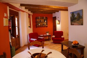 Télévision à écran plat, chauffage par le sol