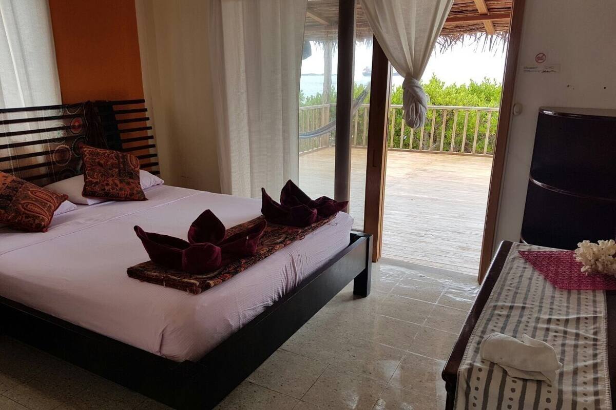 Double Room, Ocean View | Iron/ironing board, free WiFi, bed sheets