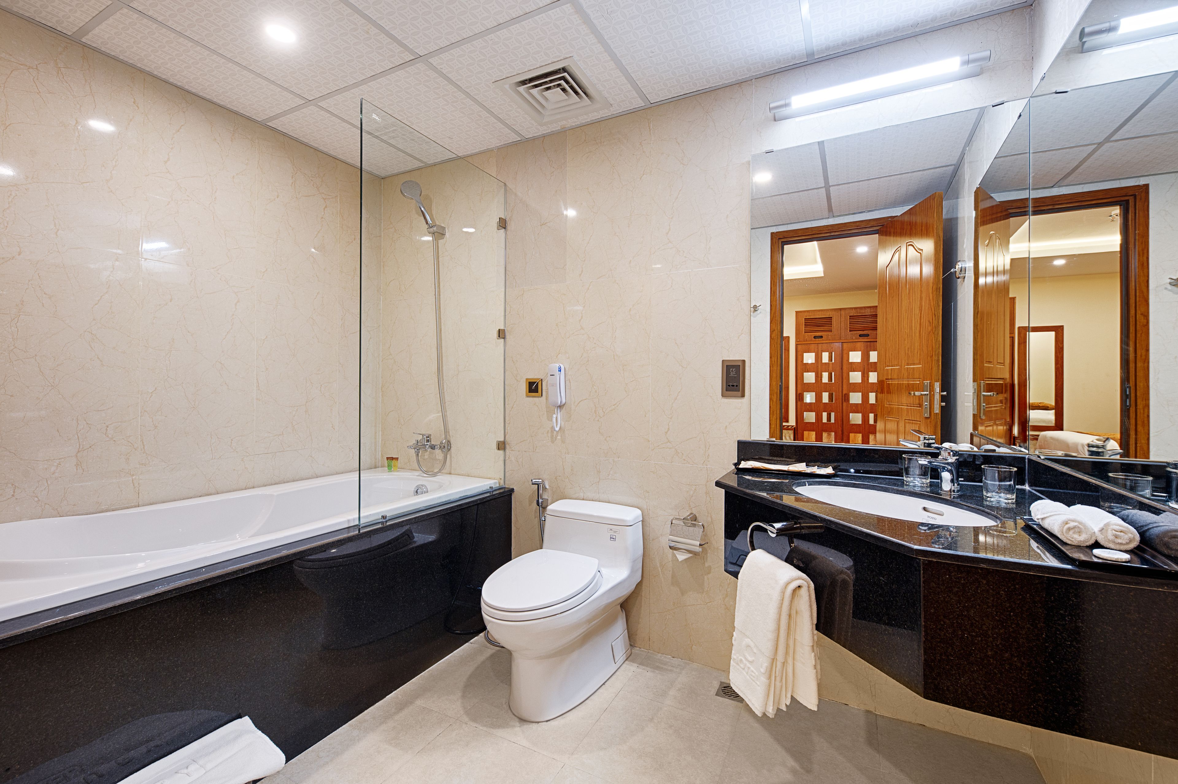 combined shower/bathtub, deep-soaking bathtub, rainfall showerhead