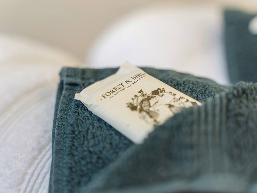 A piece of clothing with a label that reads "FOREST & BIRJU BOTANICAL SKINCARE".