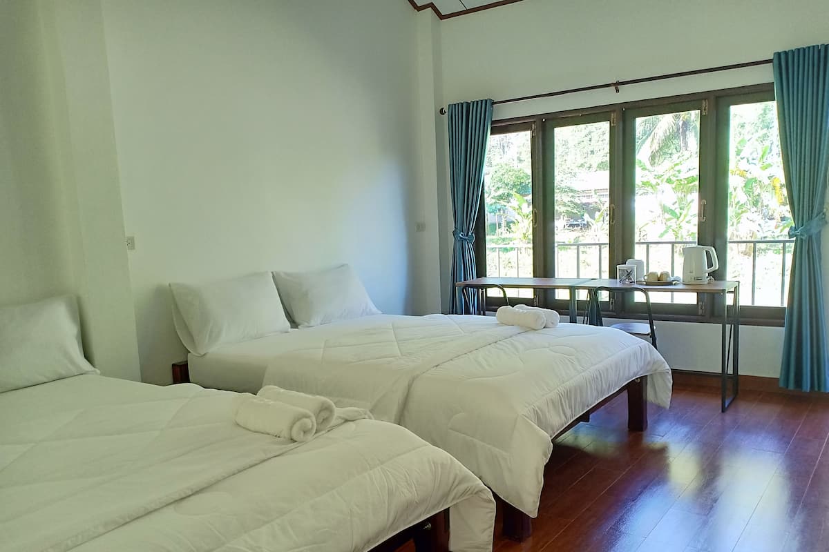 Premium bedding, blackout curtains, free WiFi, bed sheets