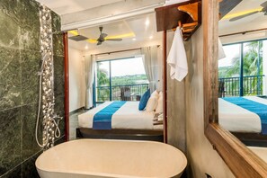Designer toiletries, hair dryer, slippers, bidet