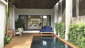 Kraam Pool Suites | Minibar, caja fuerte, cortinas opacas y camas supletorias