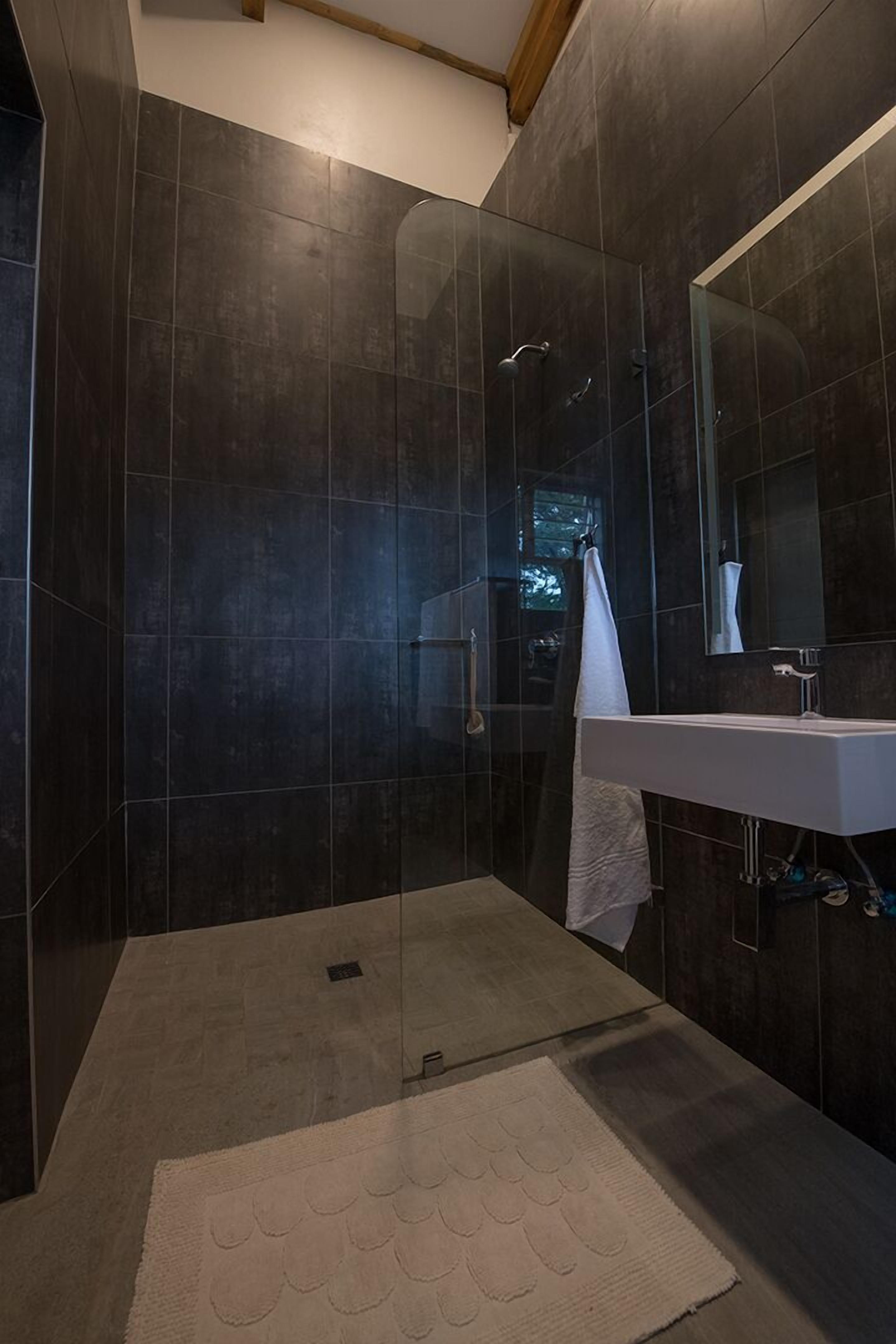 Luxury Room, 1 King Bed, Garden Area | Bathroom | Shower, designer toiletries, towels