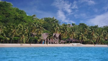 On the beach, beach towels, snorkelling, windsurfing