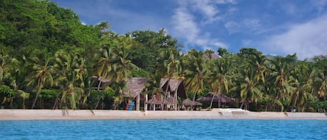 On the beach, beach towels, snorkelling, windsurfing