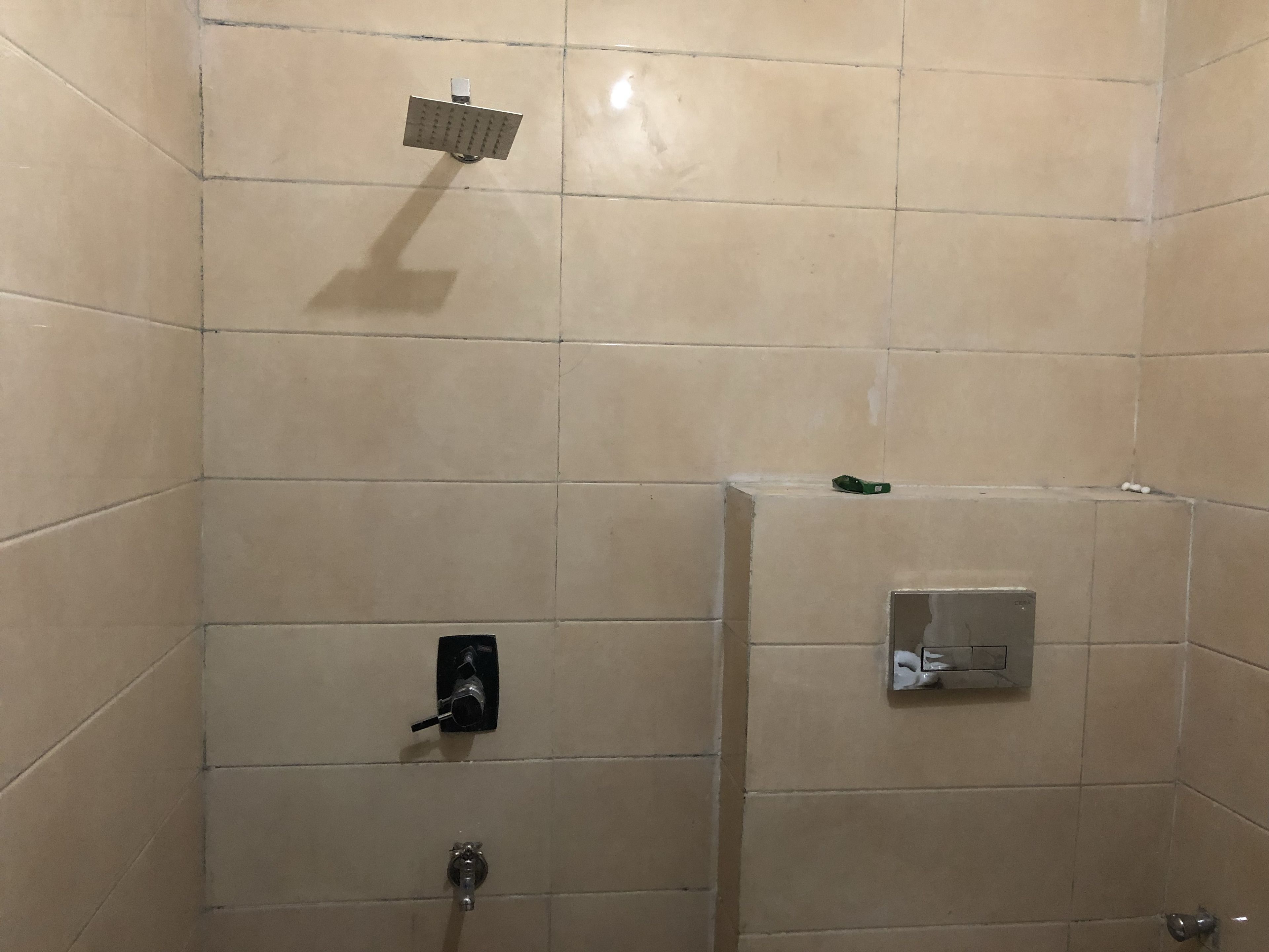 deluxe double room, 1 king bed | bathroom shower