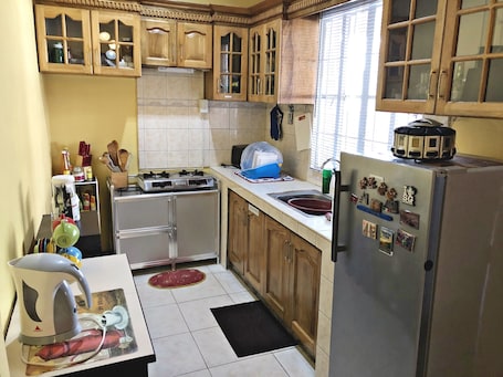 House, 1 Bedroom | Private kitchen. Kalayaan Transient House