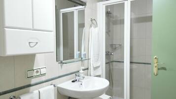Shower, free toiletries, hair dryer, towels