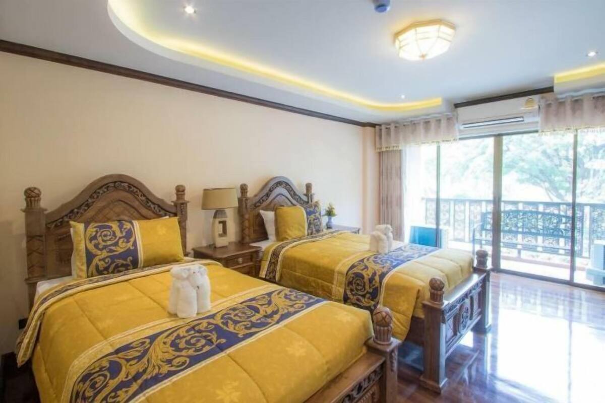 Ropa de cama de alta calidad, minibar, caja fuerte y cortinas opacas