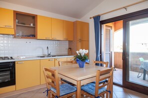 Classic Apartment, 1 Bedroom | Private kitchen - Aria di vacanza - Borgo Turchese (Olbia)