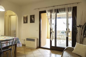Comfort Apartment, 2 Bedrooms | Living room - Aria di Vacanza - S'Abba Lughente (Olbia)