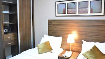 Ropa de cama de alta calidad y minibar
