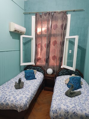 Comfort Room, 2 Bedrooms | Iron/ironing board, free WiFi