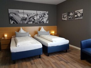 Desk, laptop workspace, free WiFi, bed sheets