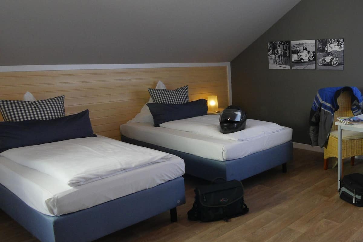 Desk, laptop workspace, free WiFi, bed sheets