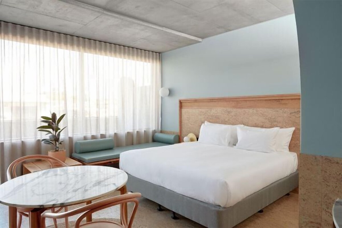 Premium bedding, pillowtop beds, in-room safe, blackout drapes