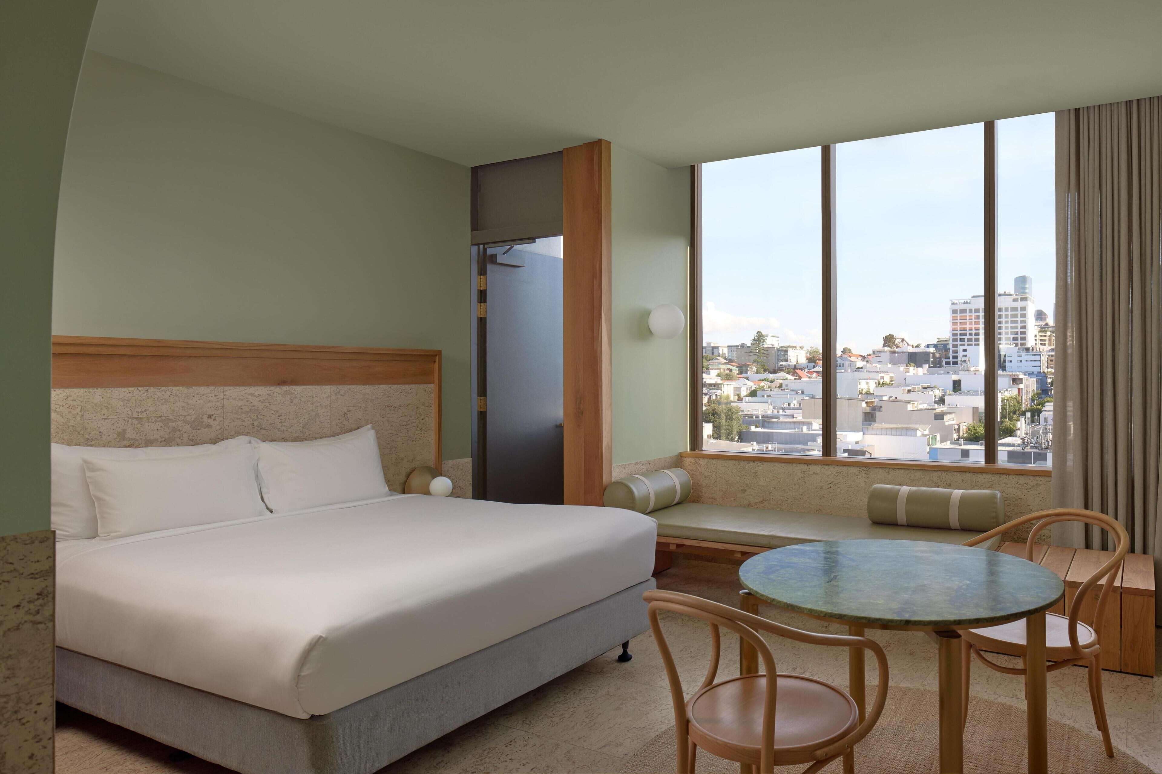 Room, 1 King Bed, City View | Premium bedding, pillowtop beds, in-room safe, blackout drapes