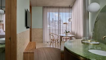 Junior Suite, 1 King Bed, City View | Premium bedding, pillowtop beds, in-room safe, blackout drapes