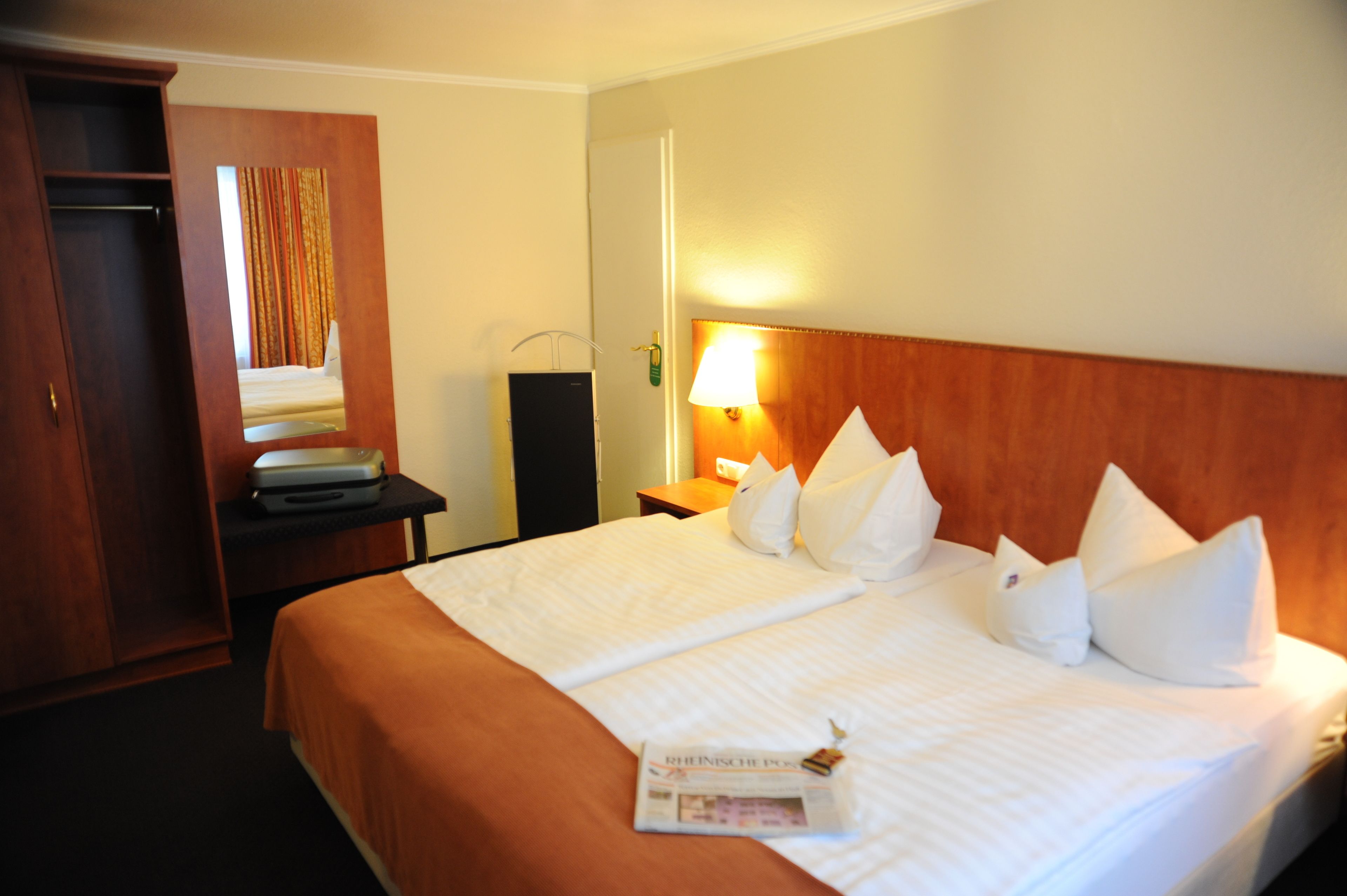 economy double or twin room | 1 bedroom, minibar, desk, blackout curtains