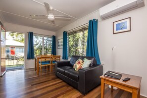 Family Apartment, 1 Bedroom, Pool Access, Garden View | Living area