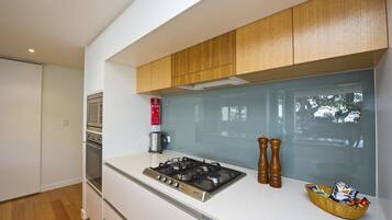 Family Apartment, 3 Bedrooms, Pool Access, Beachfront | Private kitchen | Full-size fridge, microwave, oven, stovetop