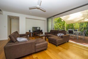 Family Apartment, 3 Bedrooms, Pool Access, Garden View | Living room | TV, DVD player