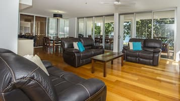 Superior Apartment, 3 Bedrooms, Pool Access, Beachfront | Living area | TV, DVD player