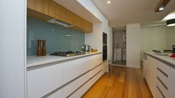 Family Apartment, 3 Bedrooms, Pool Access, Beachfront | Private kitchen | Full-sized fridge, microwave, oven, stovetop