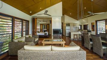 Superior Villa, 2 Bedrooms, Pool Access, Beachfront | Living area | TV, DVD player