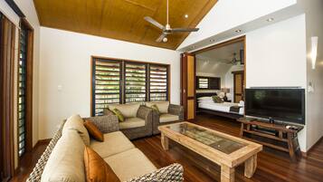 Superior Villa, 2 Bedrooms, Pool Access, Beachfront | Living room | TV, DVD player