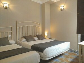 Twin Room, Courtyard View | Down comforters, desk, blackout drapes, free WiFi