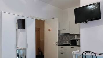 Quadrupla Superior, angolo cottura | Una cassaforte in camera, insonorizzazione, Wi-Fi gratuito, lenzuola