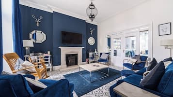 52-inch flat-screen TV with cable channels, TV