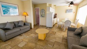 Comfort Suite, Non Smoking, Pool View | Living area | 32-inch TV with cable channels