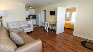 Double Room, 2 Bedrooms, Non Smoking | Living area | 32-inch TV with cable channels