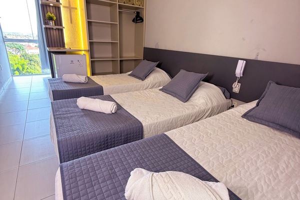Triple Room | Minibar, desk, iron/ironing board (on request), WiFi (free)